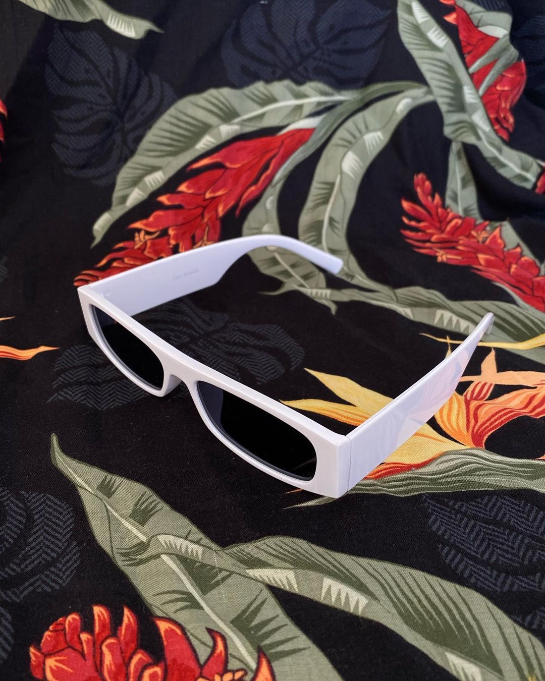 White glasses with dark lenses
