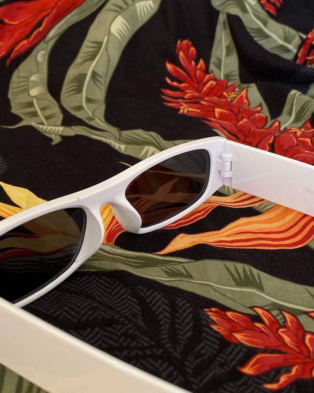 White glasses with dark lenses