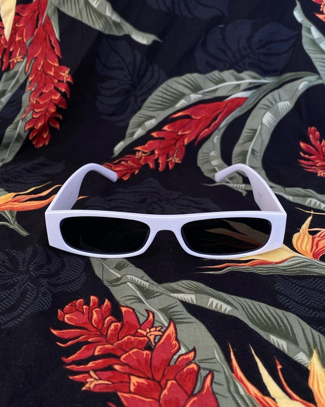 White glasses with dark lenses