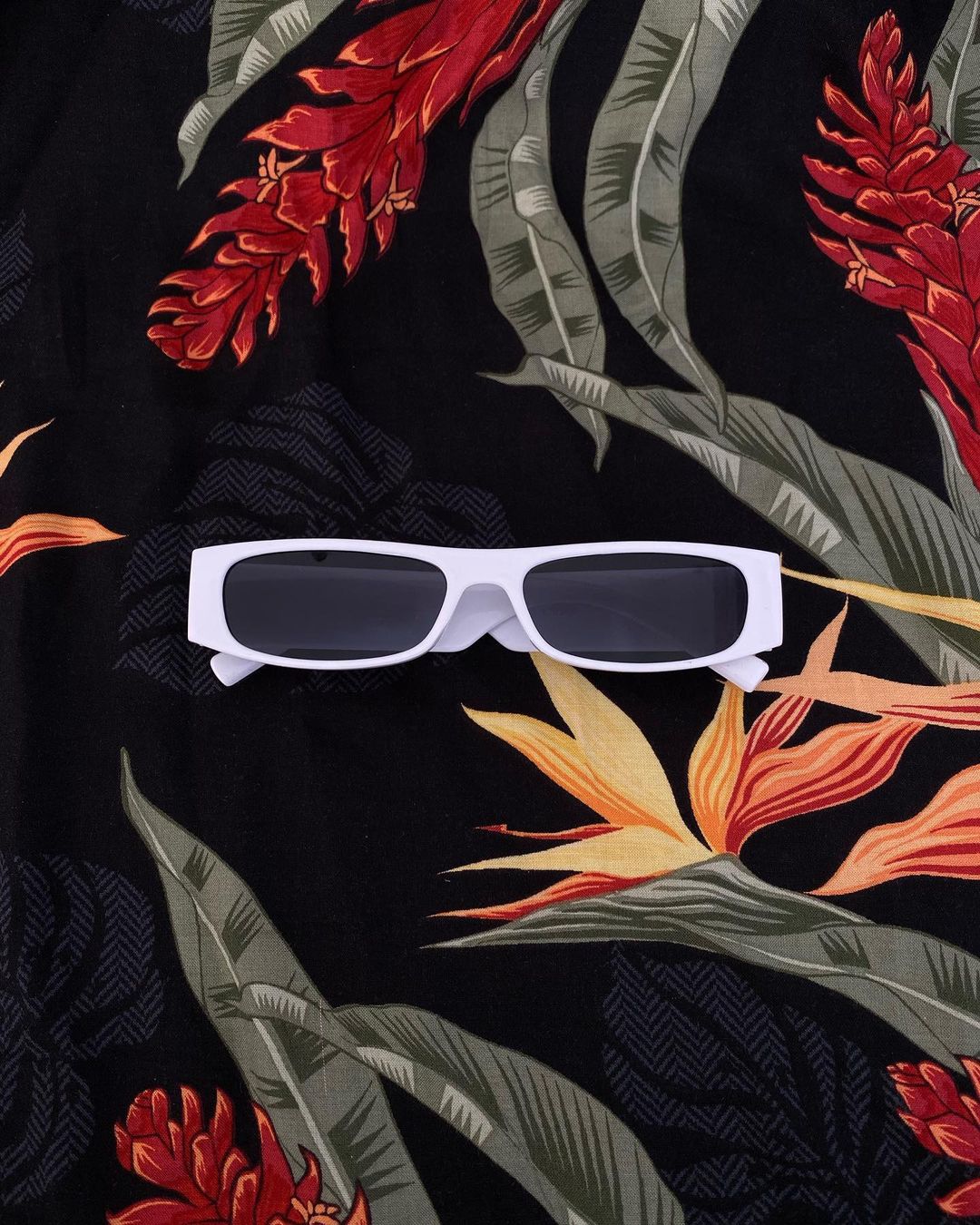 White glasses with dark lenses