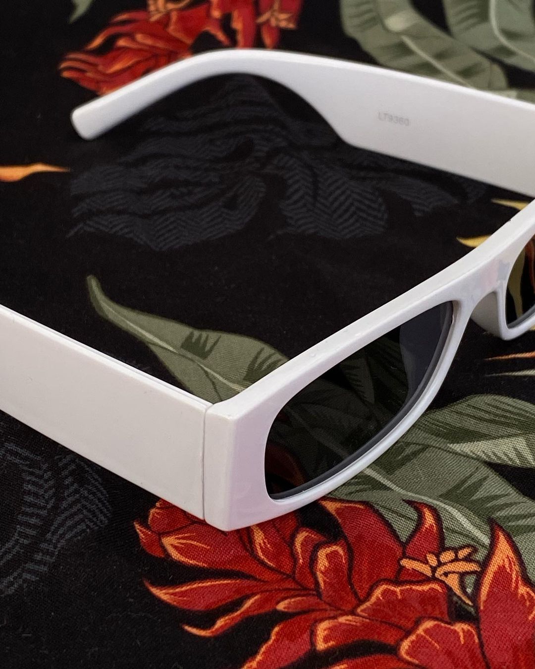White glasses with dark lenses